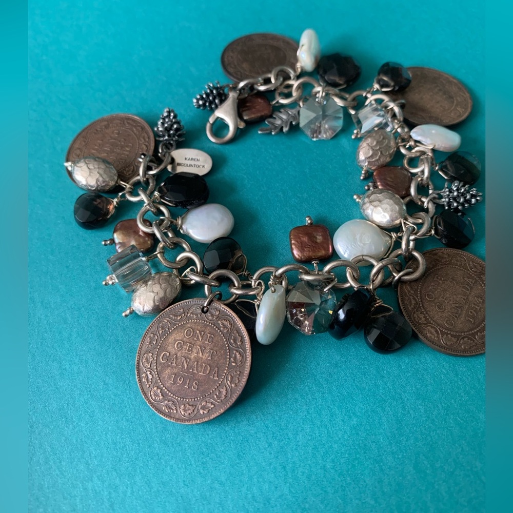 KAREN McCLINTOCK “925” silver charm bracelet mix of crystals, pearls & pennies.